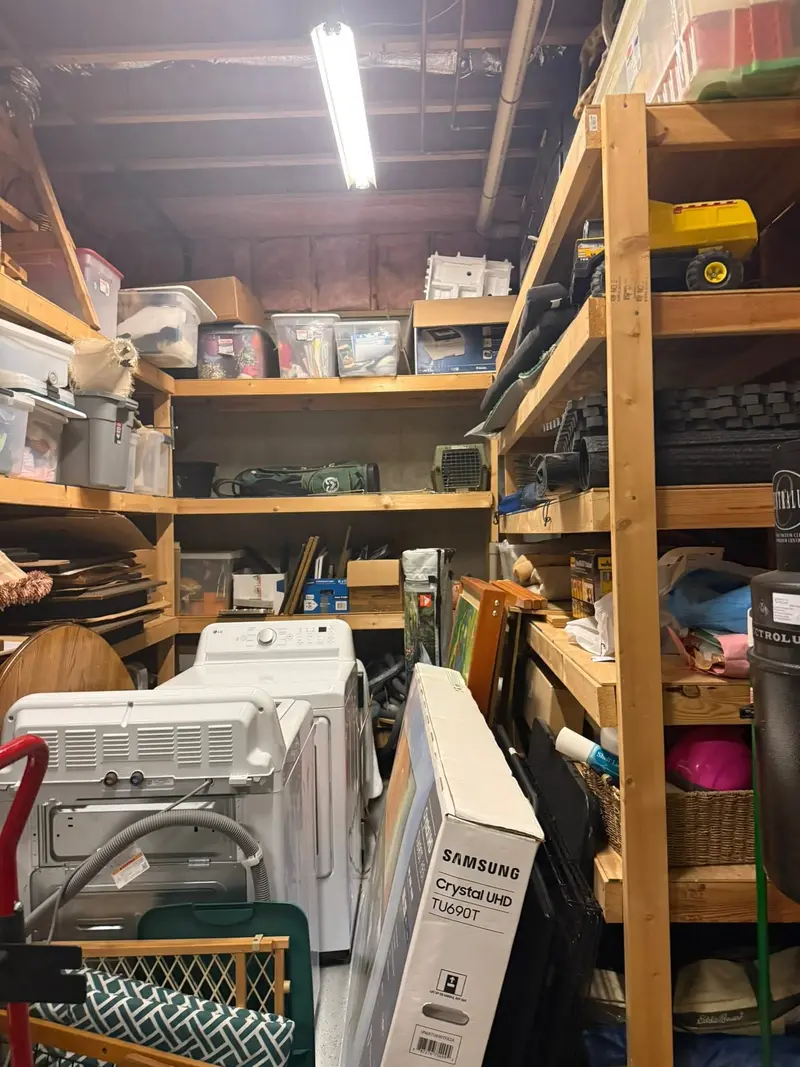 Before: a basement storage room from a north atlanta whole-home project